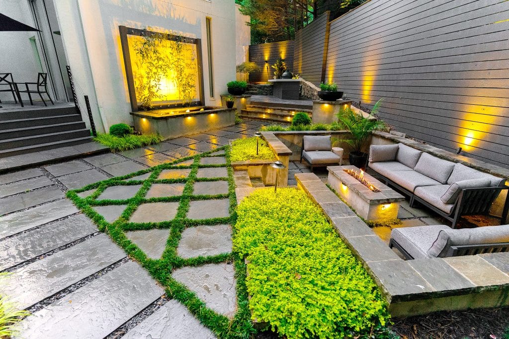Elegant outdoor patio with water feature